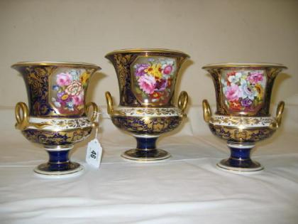 Appraisal: A BLOOR DERBY PORCELAIN GARNITURE of three campana style urn