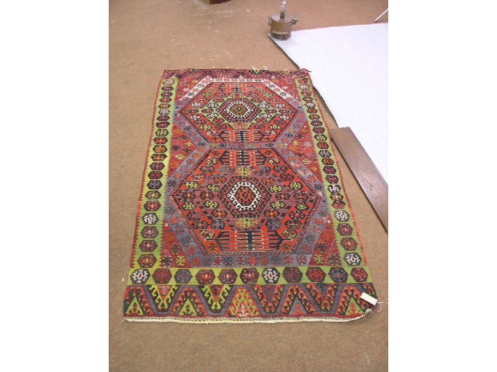 Appraisal: An early th century Eastern rug lozenge designs in red