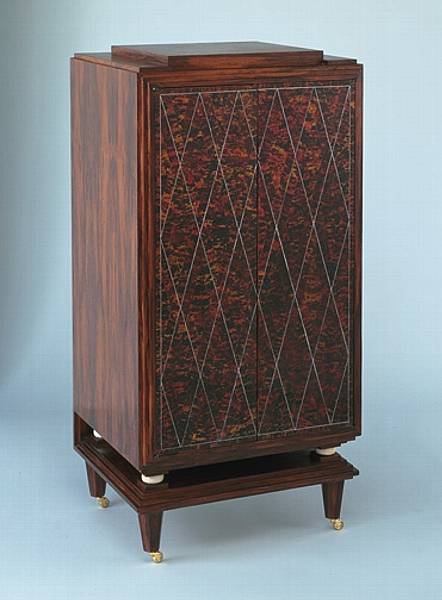 Appraisal: A pair of 'Ruhlman' Art Deco style rosewood and faux