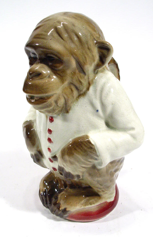 Appraisal: Continental Majolica pottery jug modelled as a monkey in jacket