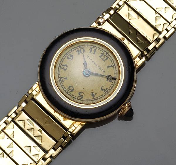 Appraisal: An art deco black onyx enamel and eighteen gold watch