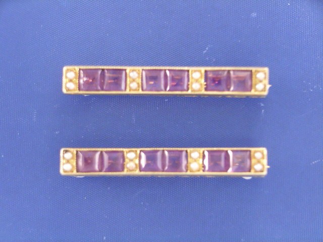 Appraisal: Two ct gold amethyst and seed pearl bar brooches length