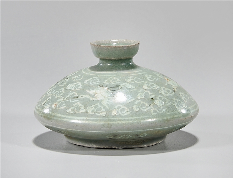 Appraisal: Korean celadon glazed cosmetic bottle with elaborate designs of birds