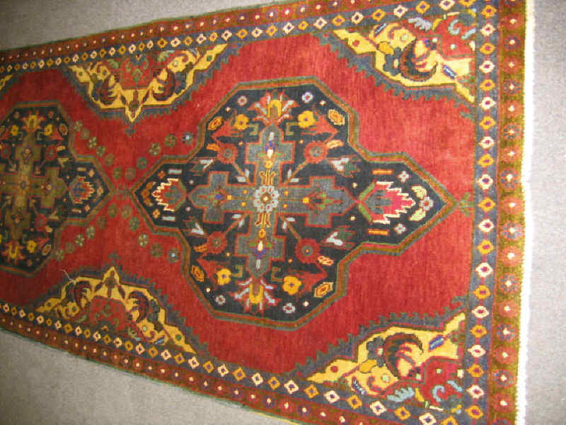 Appraisal: ARDEBIL LONG RUG The red field shows three indigo geometric