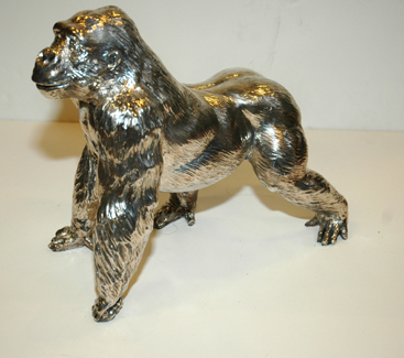 Appraisal: SILVER CASED GORILLA SCULPTURE