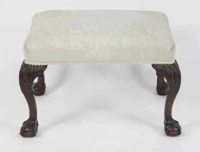 Appraisal: A George II style upholstered stool on carved cabriole legs