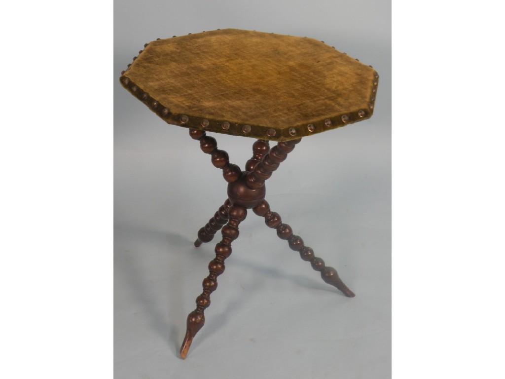 Appraisal: A Victorian walnut Gypsy type table the octagonal velvet top