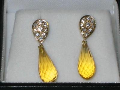 Appraisal: A PAIR OF CITRINE AND DIAMOND EARRINGS comprising briolette cut