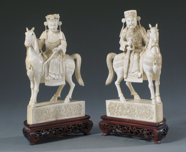 Appraisal: PAIR SOLID ELEPHANT IVORY CARVED FIGURES one depicting the Chinese