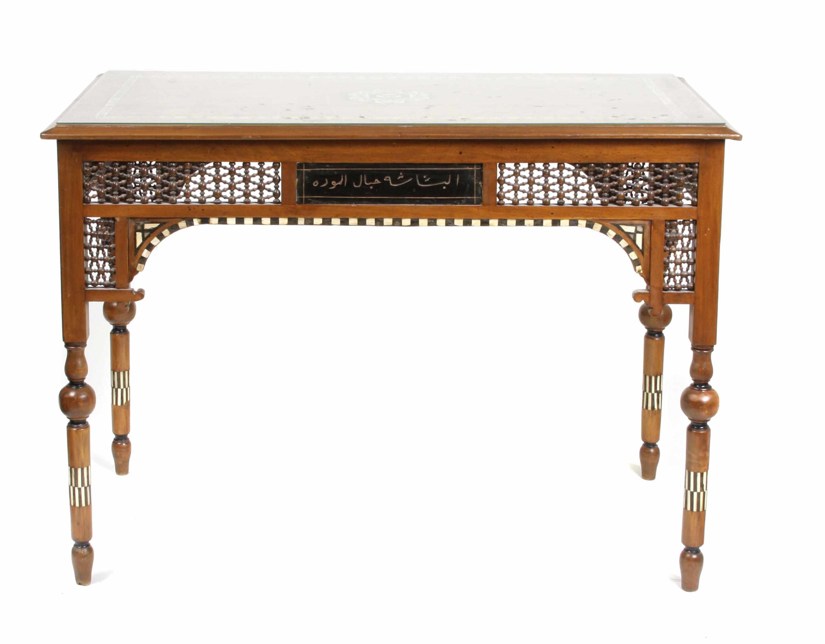 Appraisal: A Moorish style inlaid hardwood center table height in width