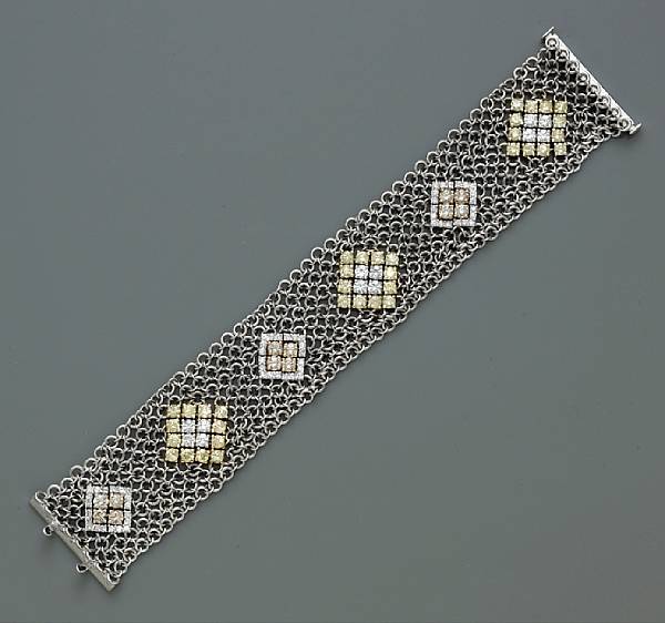 Appraisal: A diamond and colored diamond bracelet estimated total diamond weight