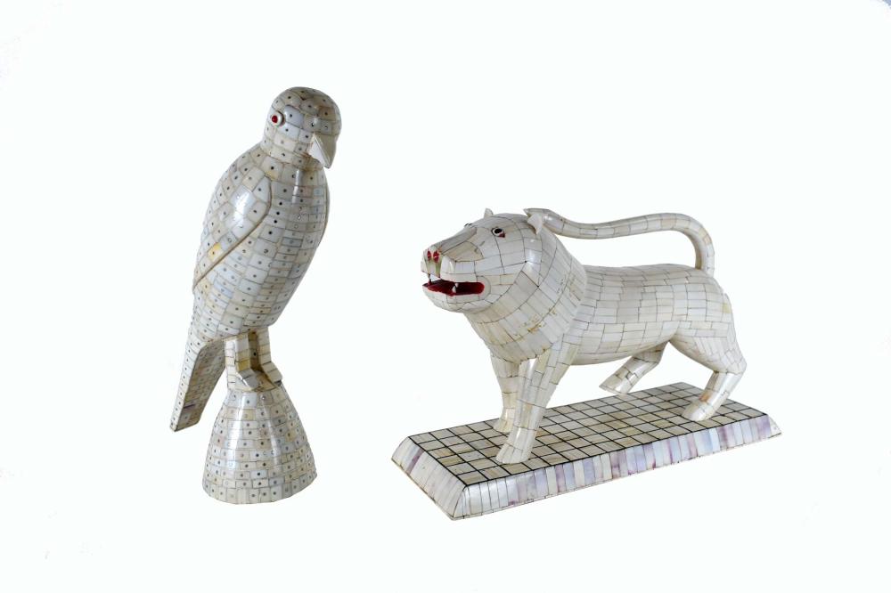 Appraisal: CONTEMPORARY BONE TILE-VENEERED LION AND A BIRDThe lion with painted