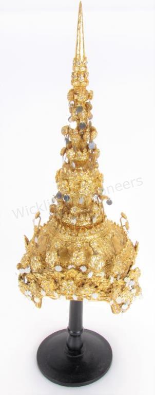 Appraisal: Thai Dancer's Headdress with a tall finial elaborately decorated with