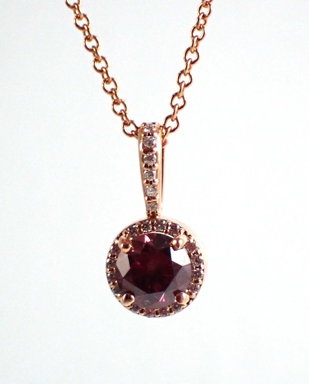 Appraisal: FANCY PINK DIAMOND AND ROSE GOLD PENDANT NECKLACE with a