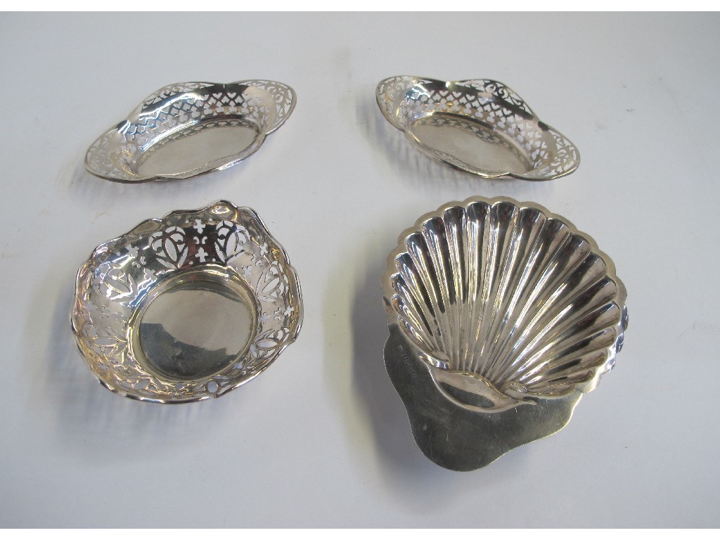 Appraisal: Lot comprising pair of silver bon bon dishes a single