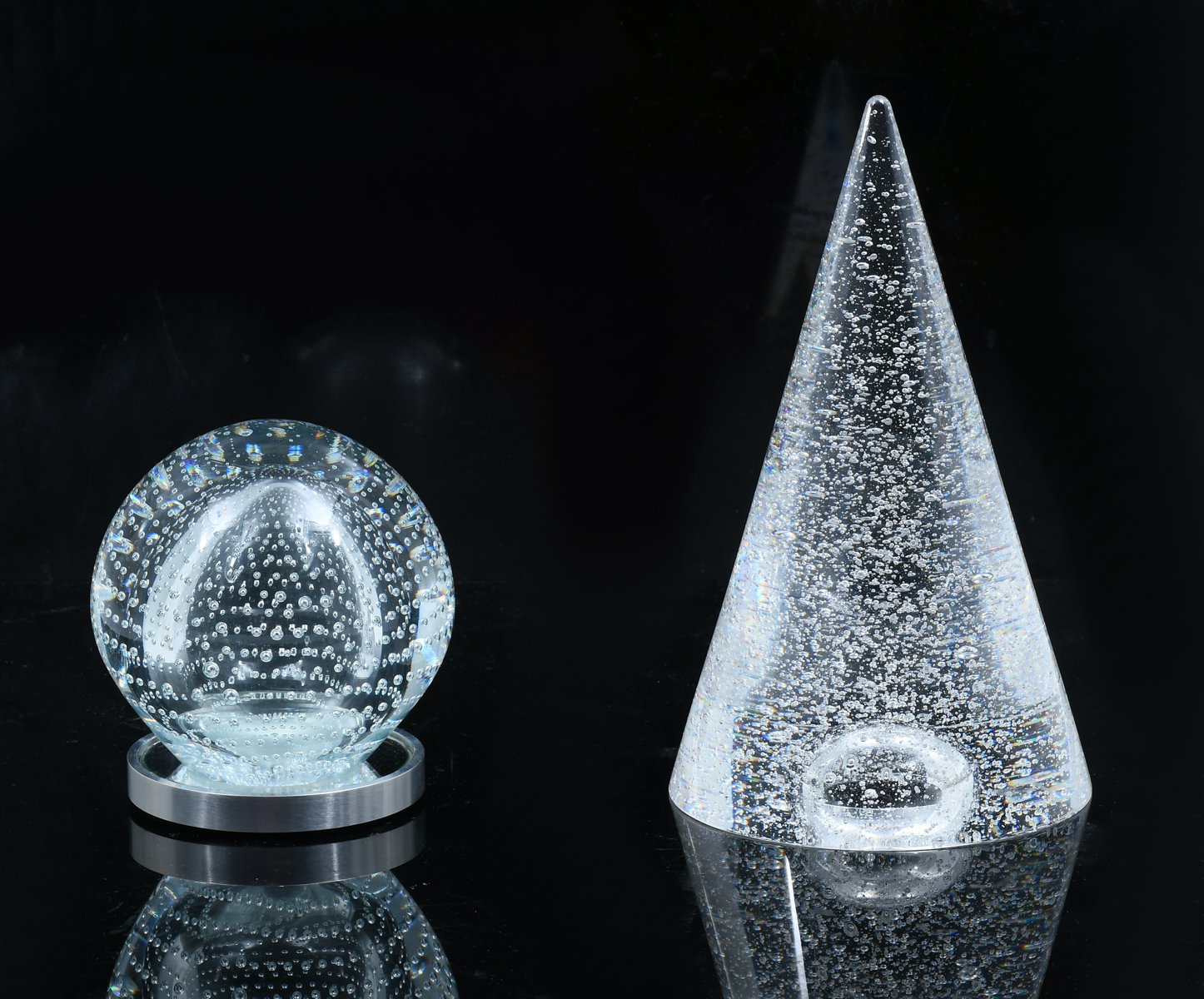 Appraisal: PC CONTROLLED AIR BUBBLE PAPERWEIGHTS Comprising - Conical form art