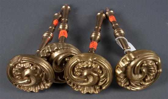 Appraisal: Set of four Continental style cast-brass curtain tiebacks Estimate -