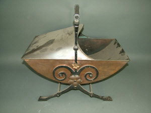 Appraisal: An early th century copper finished and wrought iron coal