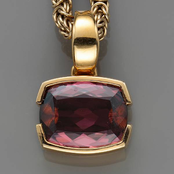 Appraisal: A pink tourmaline and eighteen karat gold pendant-enhancer with fourteen