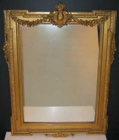 Appraisal: CONTINENTAL TH CENTURY GILT FRAMED WALL MIRROR Finely detailed crest