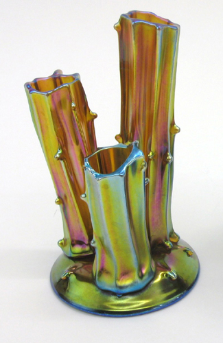 Appraisal: STEUBEN AURENE TREE TRUNKS VASE having iridescent gold field with