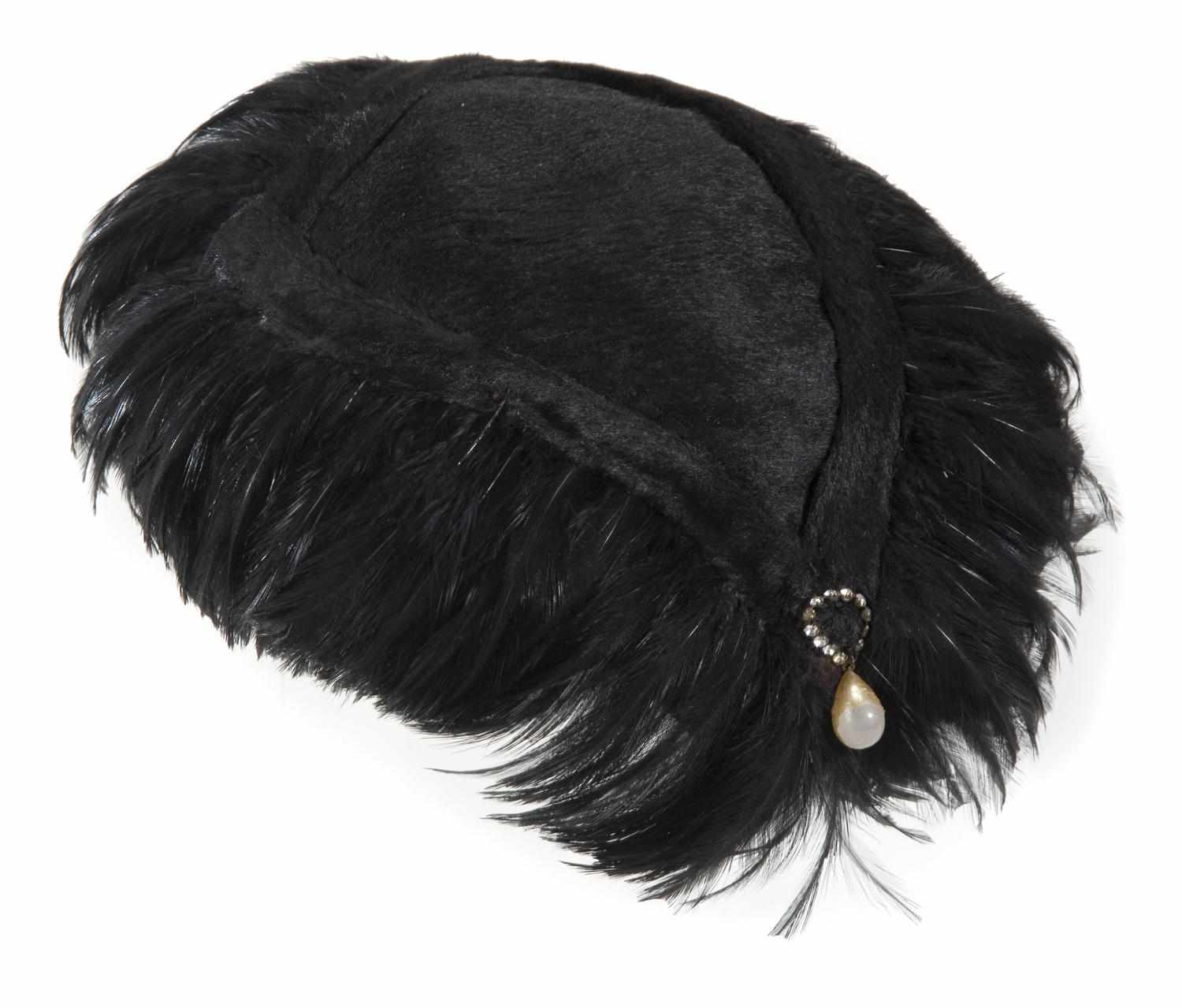 Appraisal: Lucille Ball black feathered pillbox hat Gibbe Hat label in