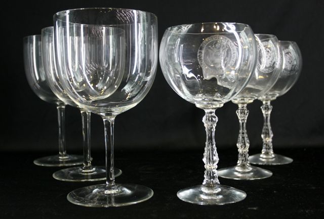 Appraisal: Three pedestal wine goblets American glass 'House of Reps' together