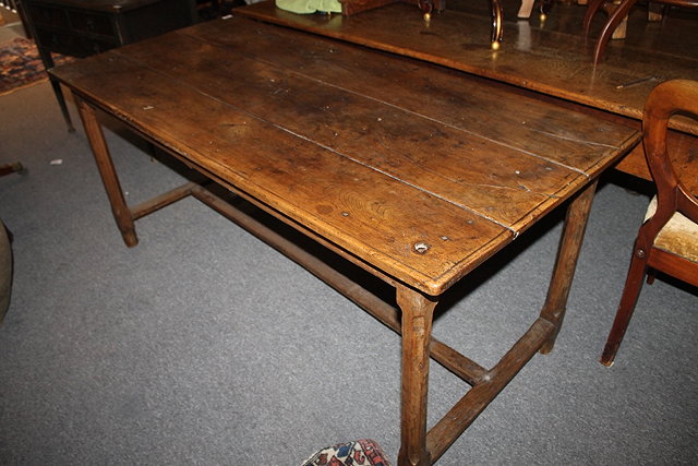 Appraisal: AN ANTIQUE ELM AND FRUITWOOD FARMHOUSE TABLE with rectangular plank