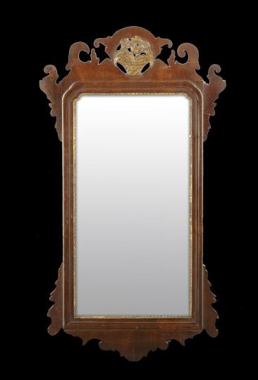 Appraisal: Georgian Carved and Parcel-Gilt Mahogany Scrolled Looking Glass third quarter