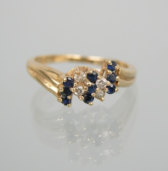 Appraisal: A Dainty Sapphire and Diamond Ring k yellow gold ring