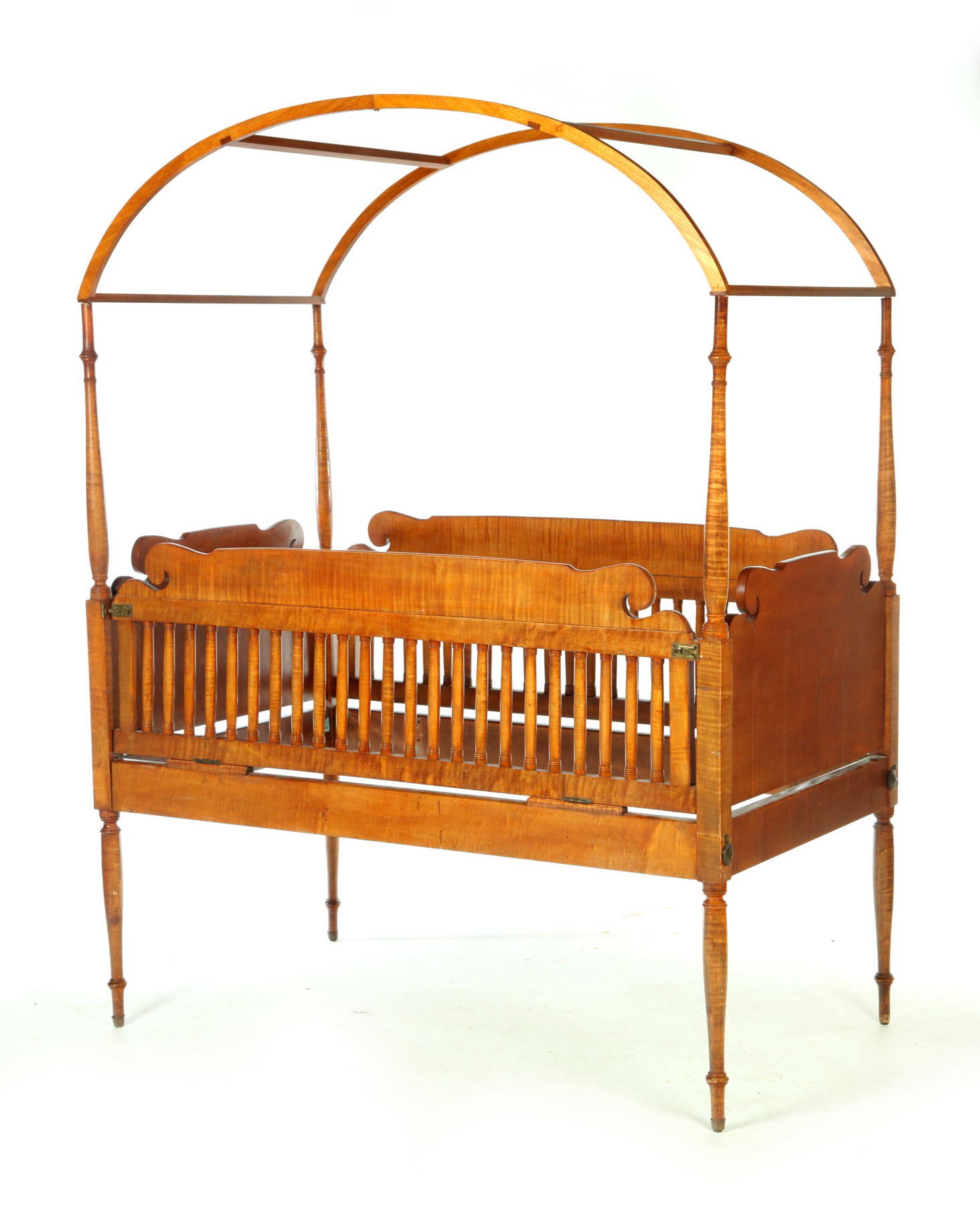 Appraisal: SHERATON CRIB American st half- th century curly maple Shaped