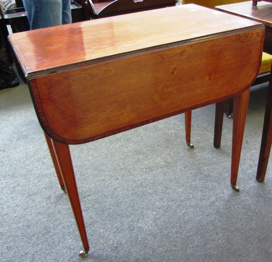 Appraisal: A George III rosewood banded mahogany Pembroke table on tapering