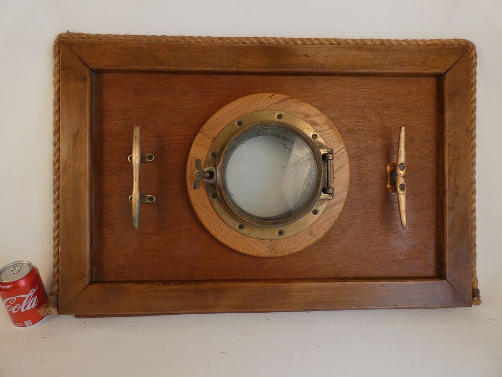 Appraisal: NAUTICAL PORTHOLE DISPLAY Old nautical display with brass porthole in