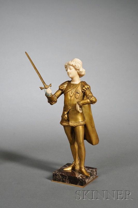 Appraisal: Gilt Bronze and Ivory Figure of a Man with Sword