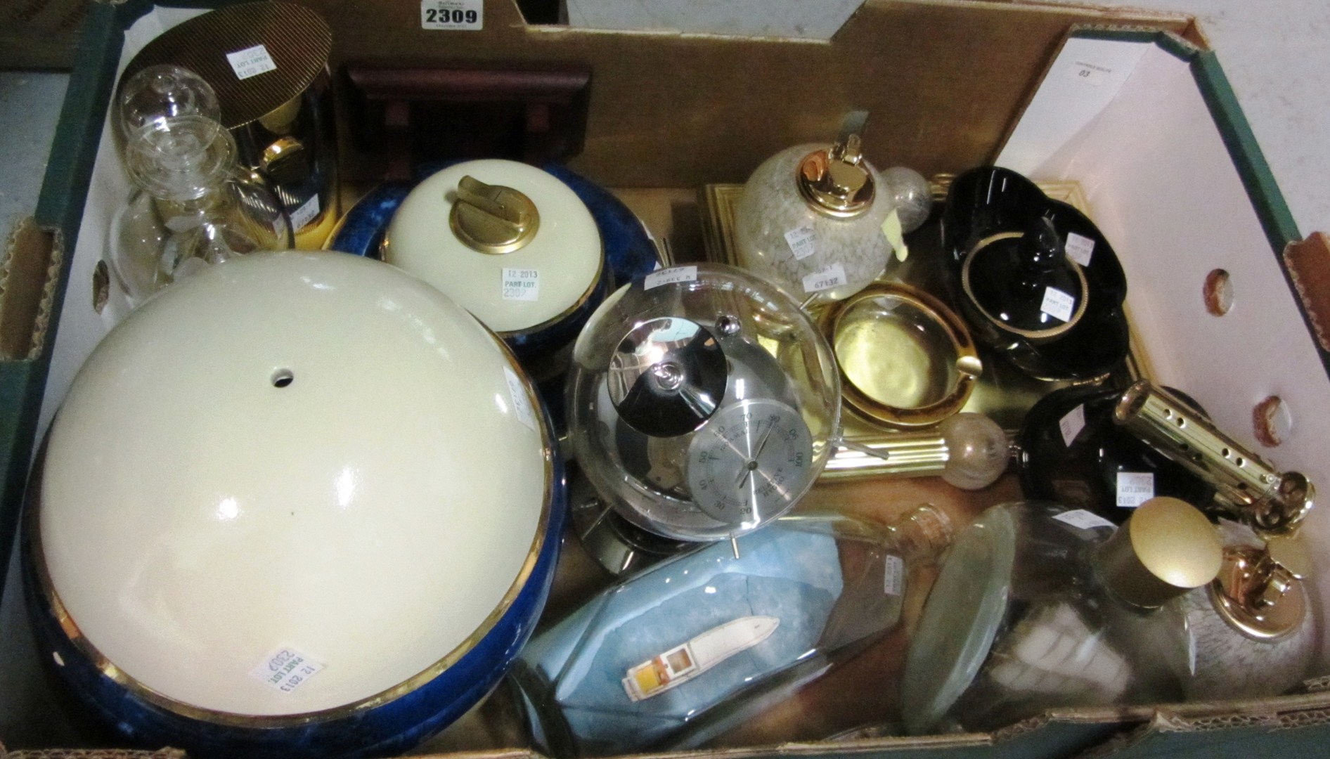 Appraisal: A quantity of collectables including table lighters barometer bottled ships