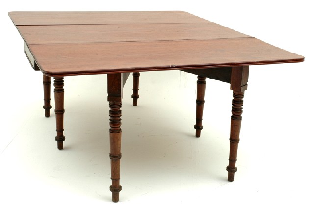 Appraisal: A LARGE TH CENTURY CEDAR DROPSIDE DINING TABLE Probably Tasmanian