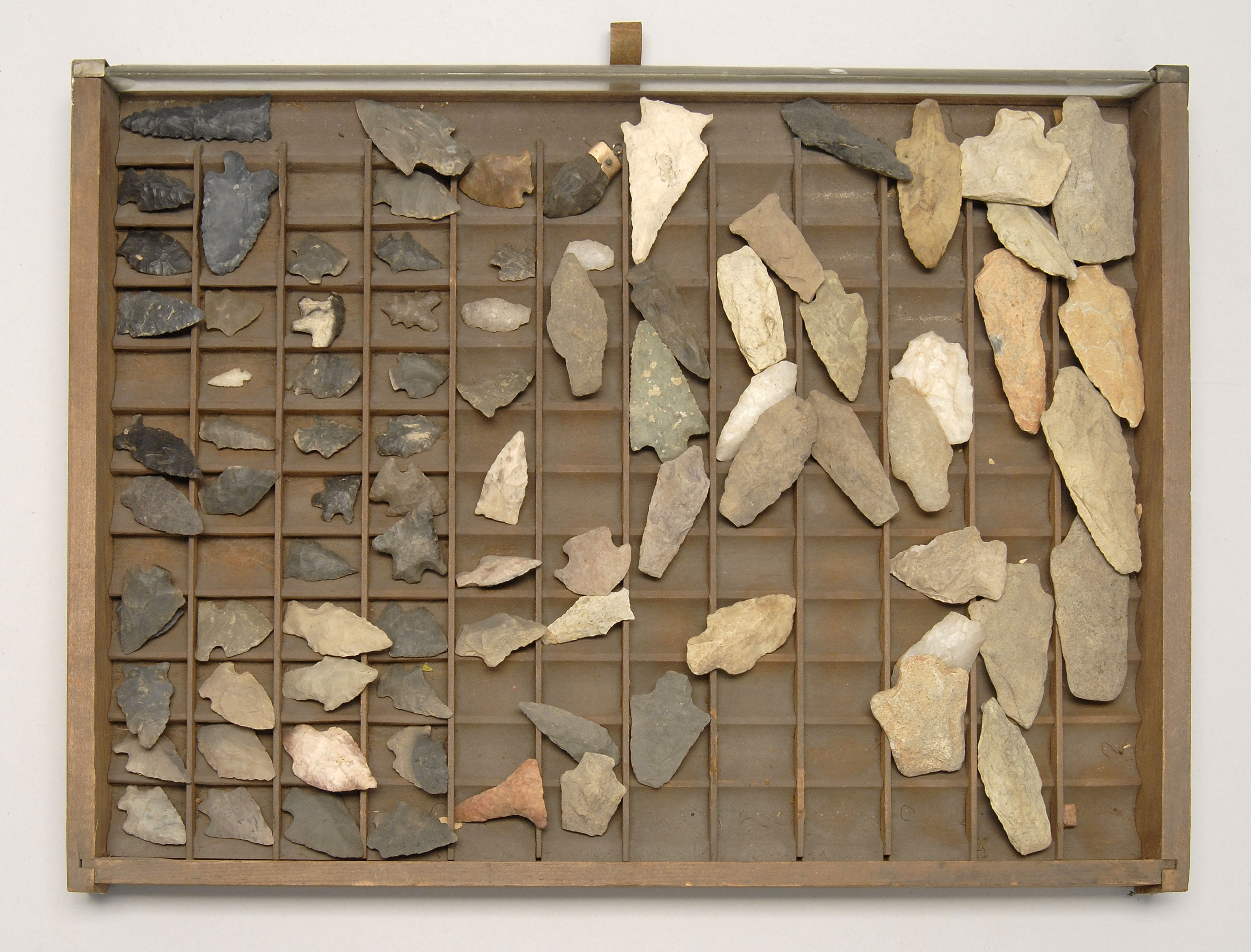 Appraisal: COLLECTION OF APPROXIMATELY EIGHTY ARROWHEADS Contained in a wooden display