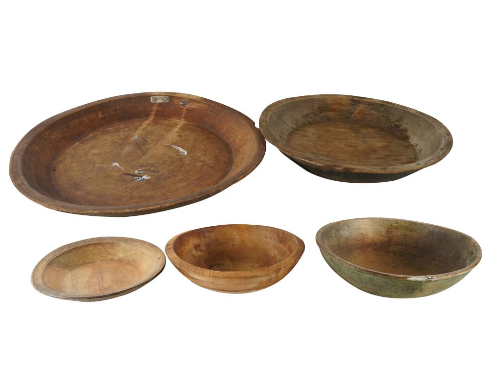 Appraisal: FIVE TREEN BOWLScomprising four round and one oblong the largest