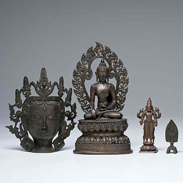 Appraisal: A Group of Asian Bronze Buddha's Each th century including