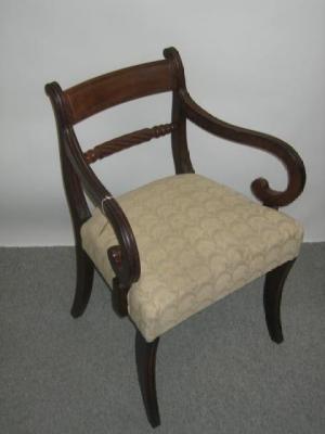 Appraisal: A MAHOGANY ELBOW CHAIR th century of Regency design panelled