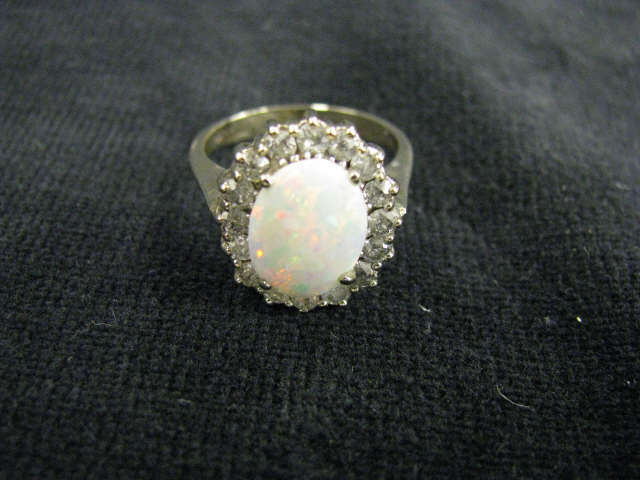 Appraisal: Diamond Opal Ring fiery x mm opal surrounded by diamonds