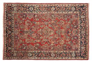 Appraisal: A Sarouk Persian rug Circa s wool on cotton foundation