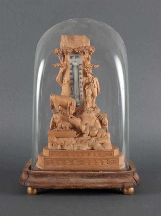 Appraisal: German carved boxwood figural thermometer with glass dome and wood