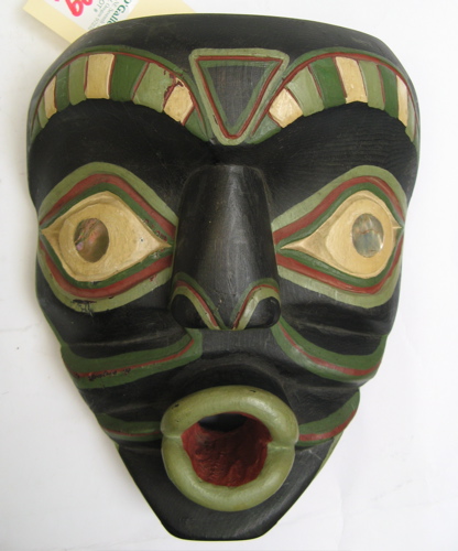 Appraisal: AN INDONESIAN COPY OF A NORTHWEST INDIAN MASK having abalone