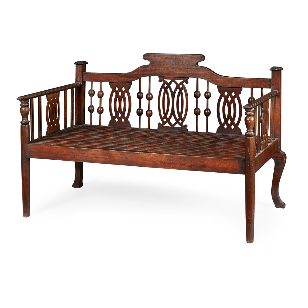 Appraisal: LARGE ANGLO-COLONIAL HARDWOOD DAYBED TH CENTURY with spindle-filled back and