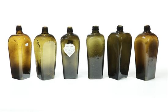 Appraisal: SIX OLIVE GLASS BOTTLES European th century Mold blown glass