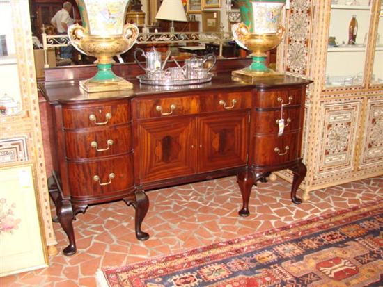 Appraisal: English inlaid mahogany breakfront sideboard circa brass gallery surmounted with