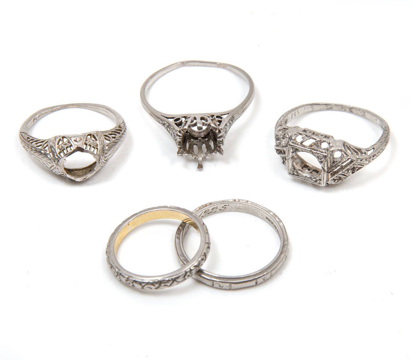 Appraisal: PLATINUM GOLD PERIOD CORRECT RINGS This lot consists of platinum