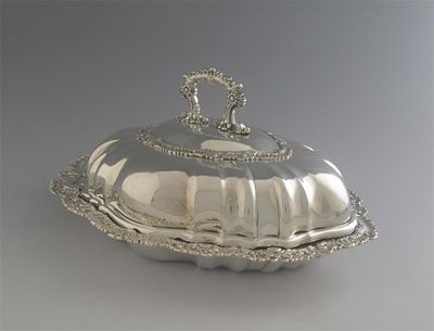 Appraisal: By Paul Storr a George IV ornate entree dish and