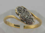 Appraisal: An carat gold and diamond ring the three stones obliquely